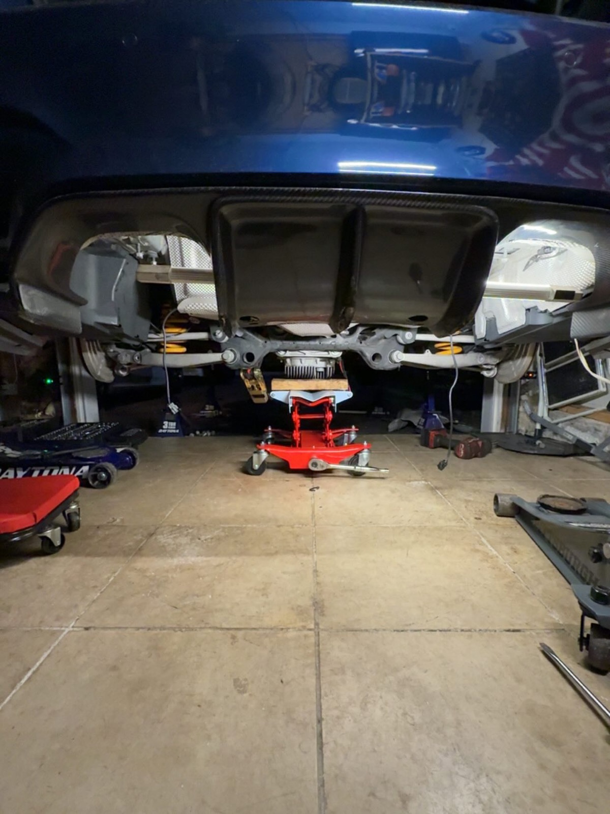 Car on the lift at the Toro Performance garage